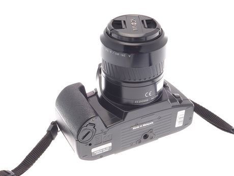 Minolta Dynax 303Si + 35-80mm f4-5.6 AF Zoom + Gegenlichtblende für A 35-80mm f4-5.6